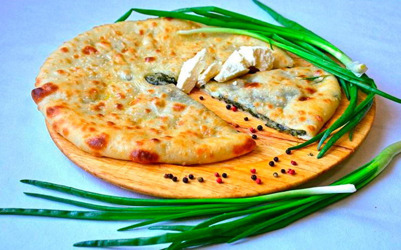 Фото осетинский пирог с сыром и зеленым луком